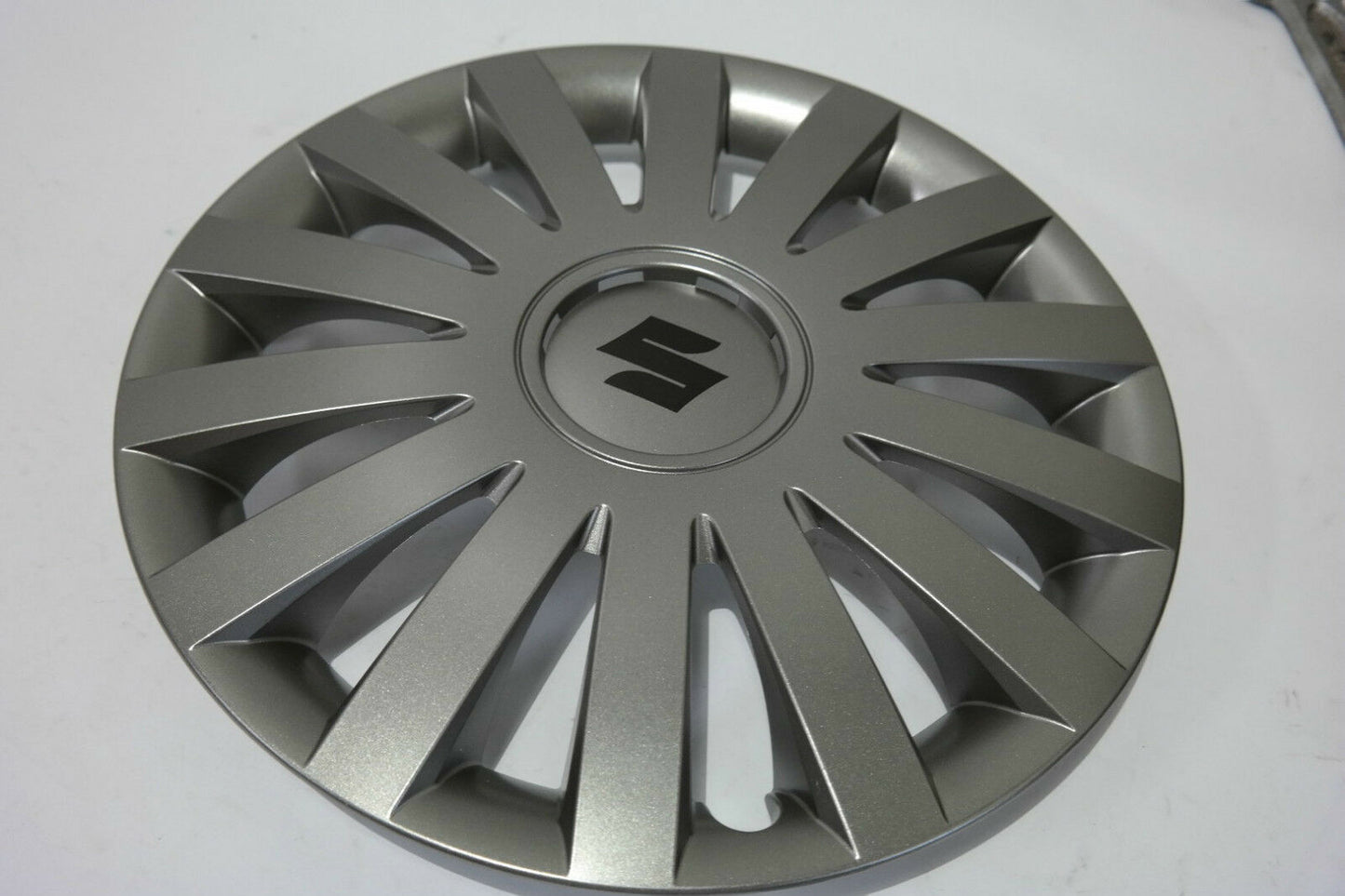NEW Genuine Suzuki SWIFT 2005-2009 Wheel Trim Trims 15" Grey SET OF 4 G38